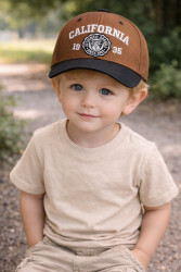 Кепки дитячі оптом